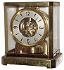 Jaeger-LeCoultre Swiss "Atmos" table clock, jeweled movement runs on changes of atmospheric pressure and temperature, gold-plated brass and glass case, serial number 33242, c1955-