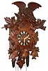 German Black Forest cuckoo and quail wall clock, 8 days, time and 1/4 strike, weight driven movement in a walnut colored case, c1900