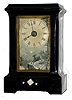 Yale Clock Co., New Haven, Conn., miniature cast iron 1-day timepiece with MOP inlay in the base and in good original condition, c1880