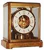 Jaeger-LeCoultre Swiss "Atmos" table clock, jeweled movement runs on changes of atmospheric pressure and temperature, gold-plated brass and glass case, serial number 118151, c1965