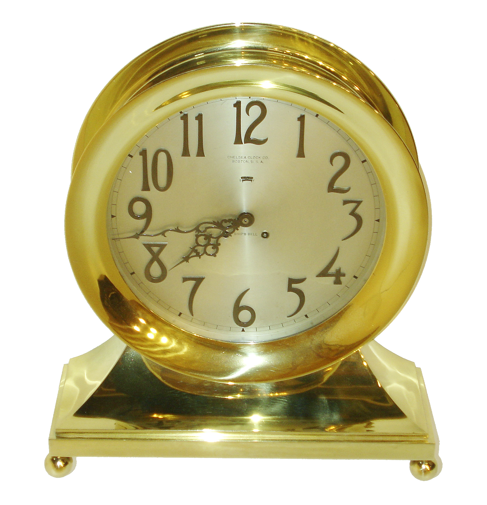 Chelsea Clock Co., Boston, "Base and Ball" model mantel clock with 12" special dial, very heavy polished, cast brass case, silvered Arabic numeral dial and serpentine hands with black finish, 8 days, movement with ships bell striking, originally sold to Bennett & Brooks in 1919 as recorded in the Chelsea account books, serial #132719 — Antique Clocks Price Guide