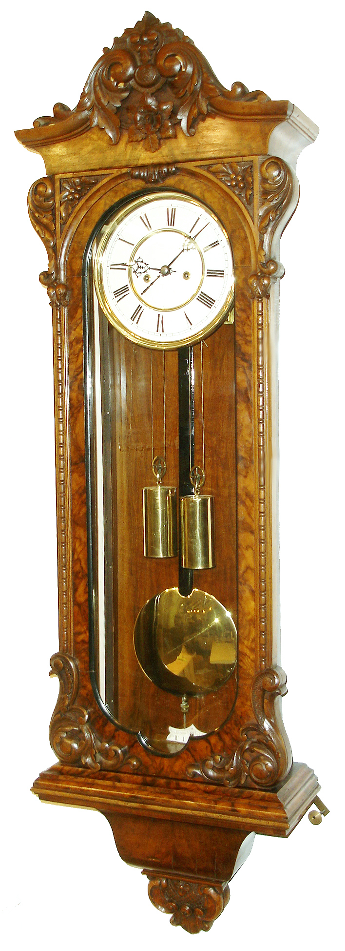 Germany or Austria, Vienna Regulator wall clock, 8 days, time and strike, weight driven movement in a carved and burled hard wood case with white enamel dial, brass weights and pendulum bob, c1870 — Antique Clocks Price Guide