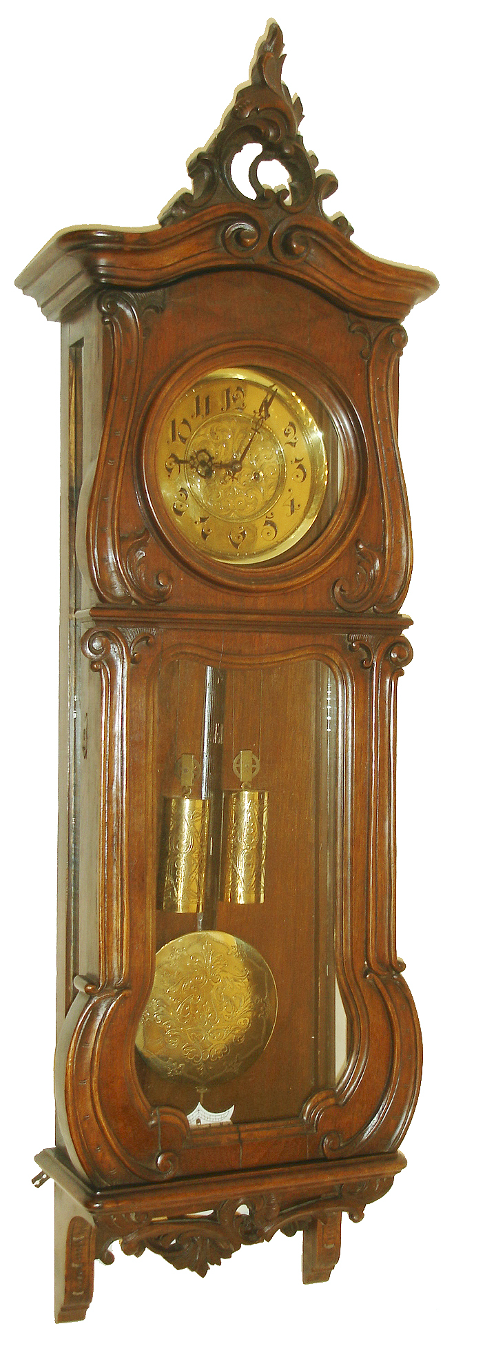 Germany or Austria, Vienna Regulator in the Baroque style, 8 days, time and strike, weight driven movement in a walnut case with engraved dial center, weights and pendulum, c1880 — Antique Clocks Price Guide