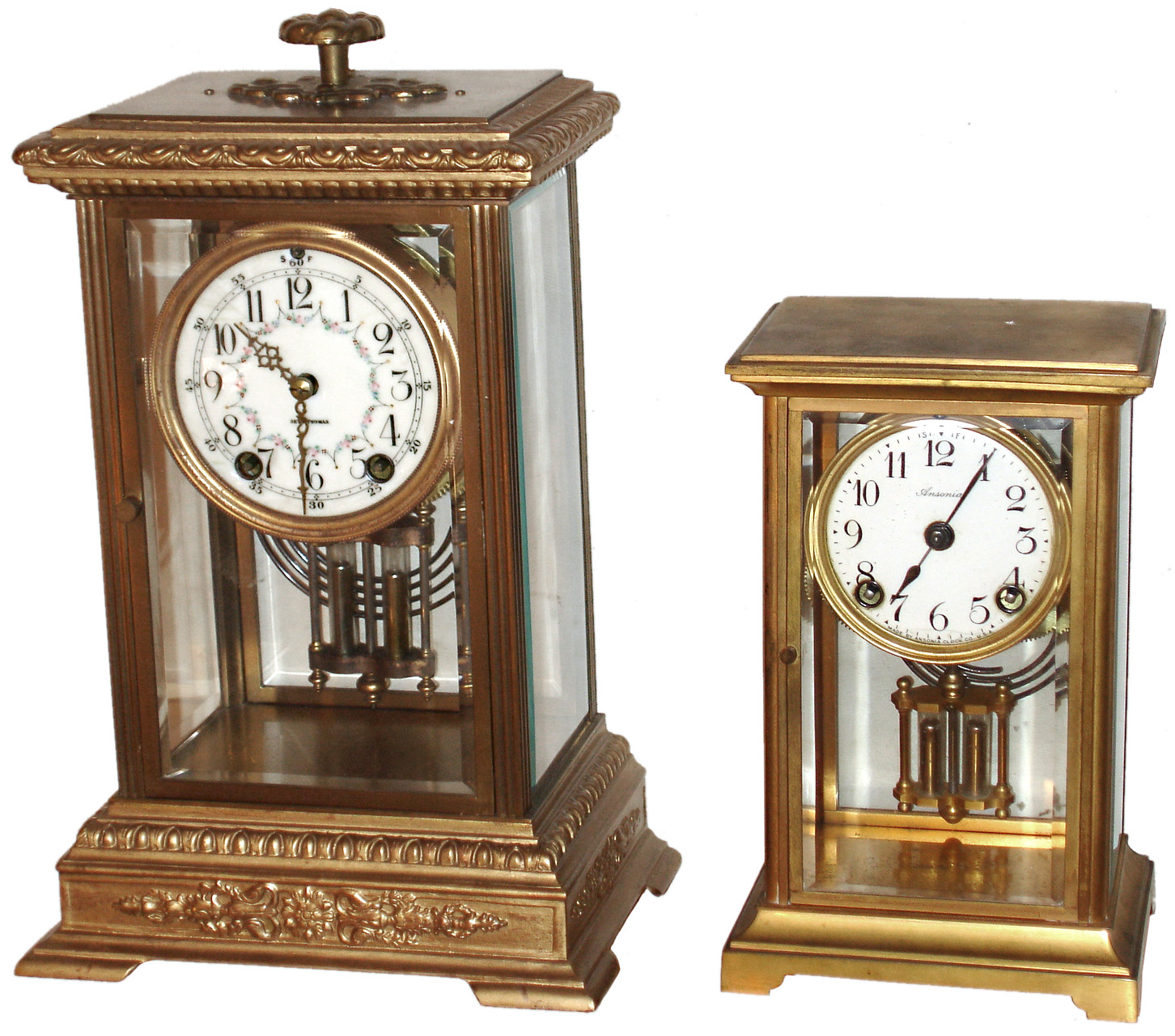 Clocks- 2 (Two) 8 days, time and strike, crystal regulator brass and glass mantel clocks: Seth Thomas "Empire"; Ansonia "Dolphin"; early 20th century — Antique Clocks Price Guide