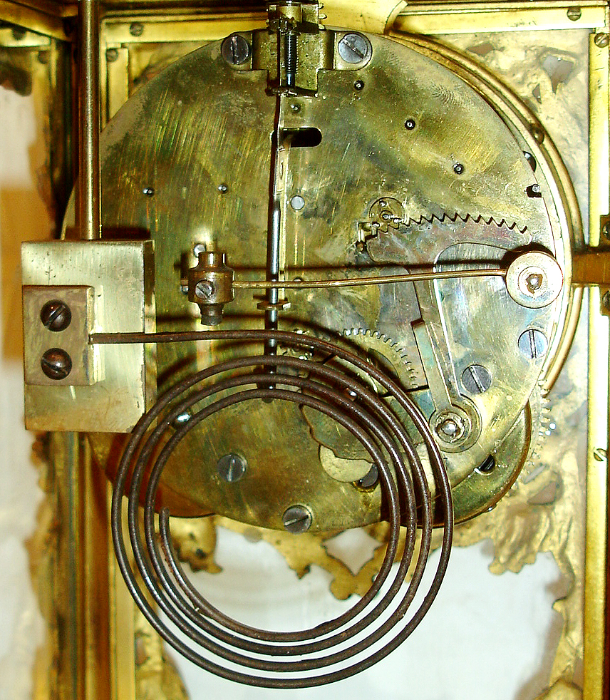 Ansonia Clock Co., New York, "Floral" cast metal with "rich gold" finish 8 days, time and strike, crystal regulator mantel clock, c1914 — Antique Clocks Price Guide