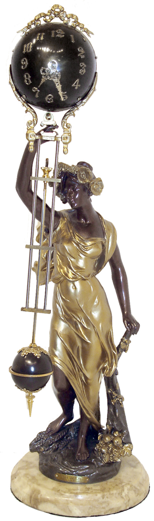 French mystery clock, gilt and patinated figure of Ceres, after Bruchon, with sheaf of wheat and cornucopia with harvest bounty, her right arm supporting the clock with compound pendulum, spherical case with bow-knot-ribbon ornament, applied Arabic numerals and Louis XV style hands containing the 8 days, time only movement, gridiron style assembly with ornamented smaller sphere at bottom, all mounted to a turned marble base, c1890 — Antique Clocks Price Guide