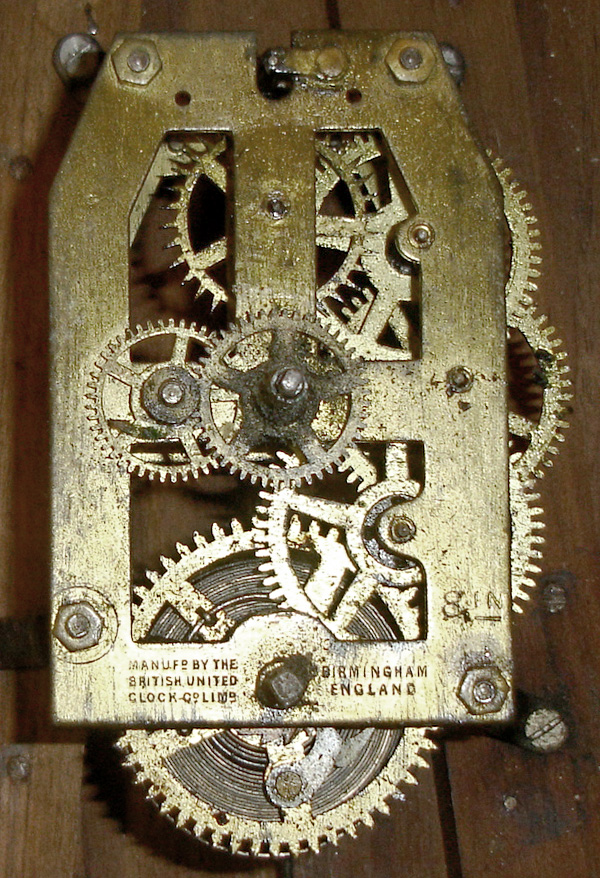 British United Clock Co., Birmingham, England, 8 days, paper mache advertising clock for Milkmaid Milk "Now's The Time to Buy It". At first glance this timepiece looks to be a Baird clock, but is English made, c1900. — Antique Clocks Price Guide