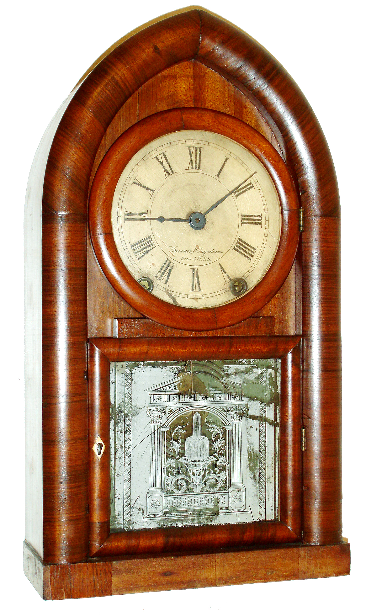 Brewster & Ingrahams, Bristol, Conn., beehive or "Round Gothic" mantel clock, 8 days, time and strike, Kirk's Patent repeating brass movement with cast iron back plate in a mahogany veneer case with painted wooden dial and monochrome silk screened tablet, c1843 — Antique Clocks Price Guide