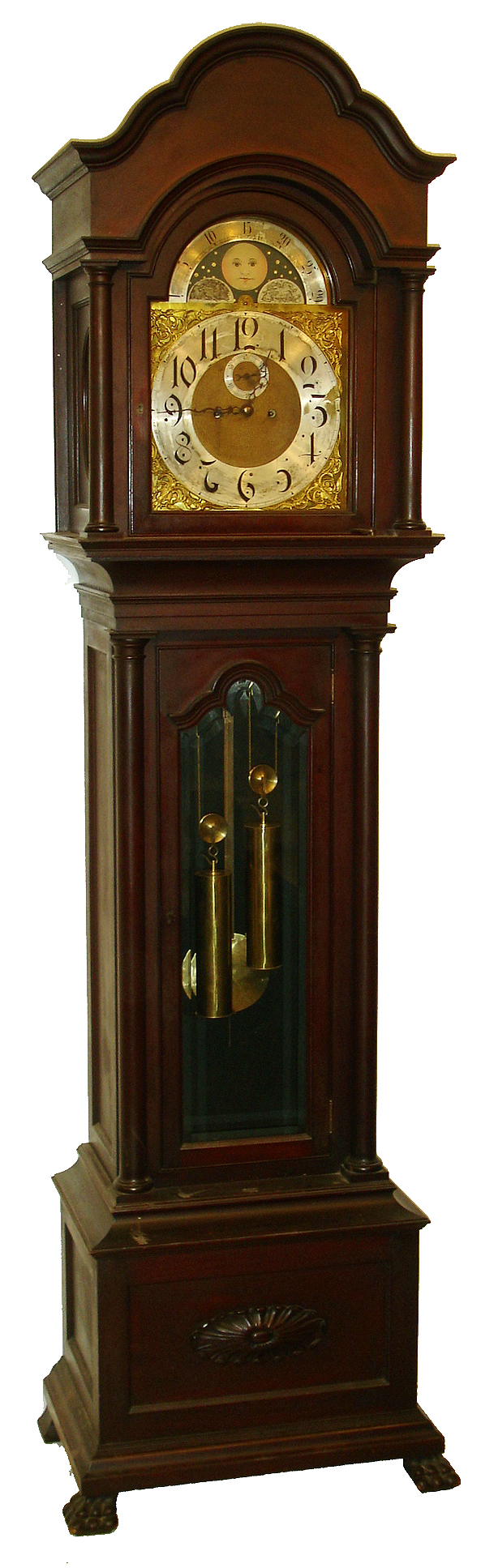 German tall clock, 8 days, time and strike, brass weight driven movement in a mahogany case with full columns and beveled glass door in trunk with brass dial, silvered chapter ring, moon phase and brass spandrels, c1910 — Antique Clocks Price Guide