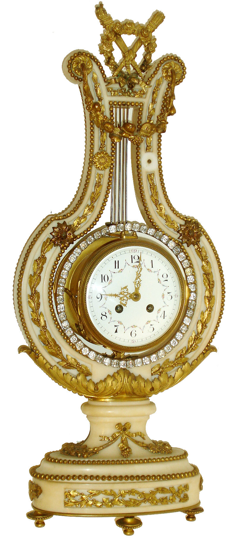 France, lyre clock, white marble case with molded base decorated with gilt trim and foliate ornament, the lyre with acanthus, floral garlands, beaded trim, and a large festoon of fruits and flowers, the top with wreath, torch, and quiver, white enamel Arabic numeral dial with polychrome enamel decoration, gilt Louis XV style hands, gilt bezel with convex glass, and a ring of brilliants surrounding the dial and attached to the pendulum, and oscillating with it, 8 days, time and strike, Pendule a Paris movement, c1900 — Antique Clocks Price Guide