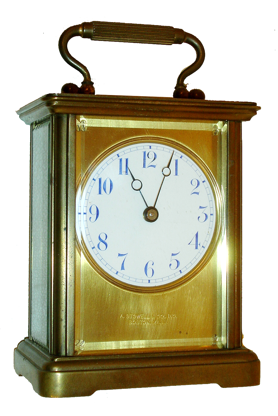 Chelsea Clock Co., Chelsea, Mass., for A. Stowell & Co., Boston, carriage clock, gilt case with beveled glass panels, Arabic numeral white enamel dial, 7 jewel 8 days, time only movement with lever escapement, serial #37394, c1915 — Antique Clocks Price Guide