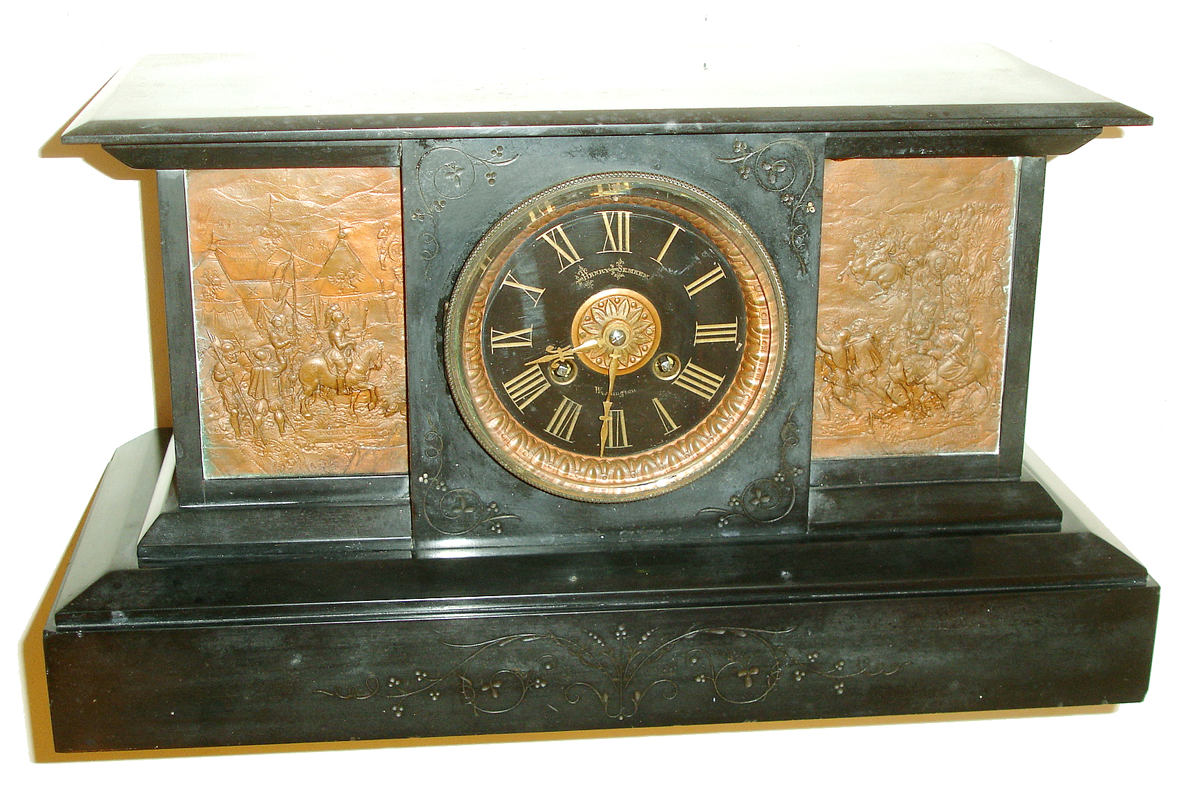 French, for Henry Semkem, Washington, black slate mantel clock, the front with incised line decoration, patinated bronze panels with Roman soldiers on horseback, some carrying severed heads on pikes, the left panel marked "Imperator" below their commander, patinated bezel with beveled glass, Roman numeral black slate dial, gilt hands, 8 days, time and strike, movement, c1880 — Antique Clocks Price Guide