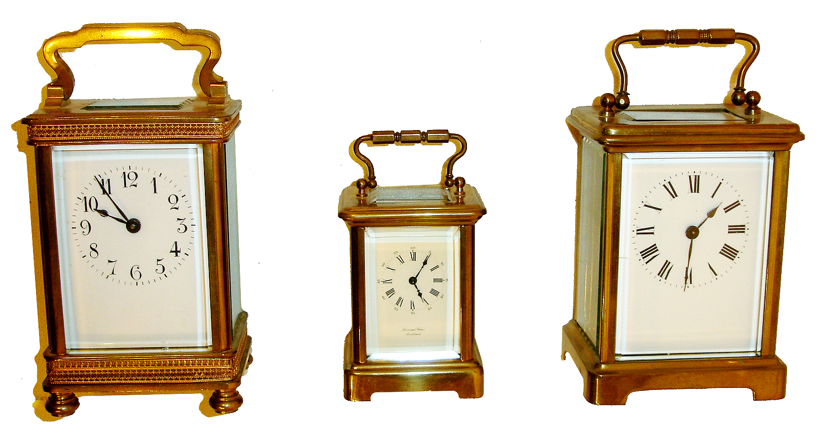 French carriage clocks- 3 (Three), all 8 days, time only movements and with lever platforms, the first a Mignonette #2, polished brass Corniche case, Roman numeral white painted dial signed "Bornand Freres Montbeliard", the others of standard size, one with polished brass Corniche case, Roman numeral white enamel dial, the other in a polished brass case on turned feet, with gilt, pierced brass frets at top and bottom, Arabic numeral white enamel dial, all 20th century — Antique Clocks Price Guide