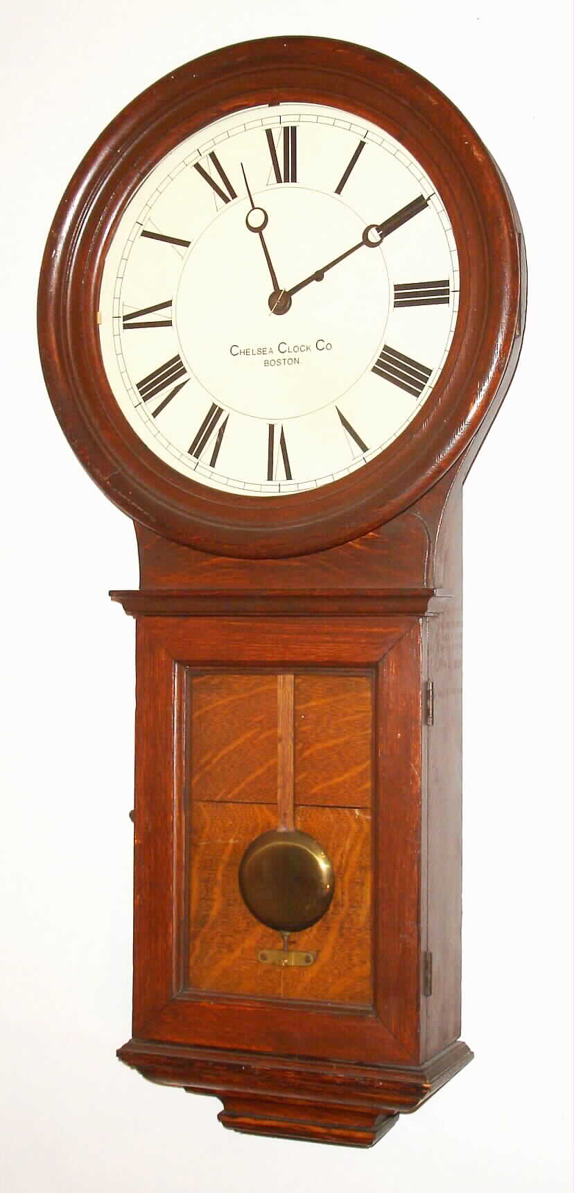 Chelsea Clock Co., Boston, Mass., 8 days, "Pendulum No. 1", 8 days, oak case wall time piece. Serial no. 65749, c1912 — Antique Clocks Price Guide
