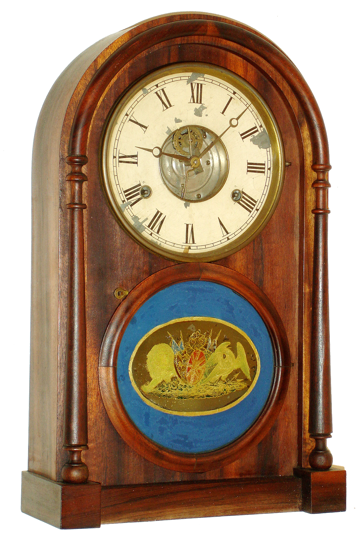 N.L. Brewster, Bristol, Conn., tin plate mantel clock, 8 days, time and strike, spring driven, tin plate movement with J. Ives Patent rolling pinion and rolling escapement in a mahogany veneer case with turned columns, painted metal dial reverse painted tablet, c1862 — Antique Clocks Price Guide