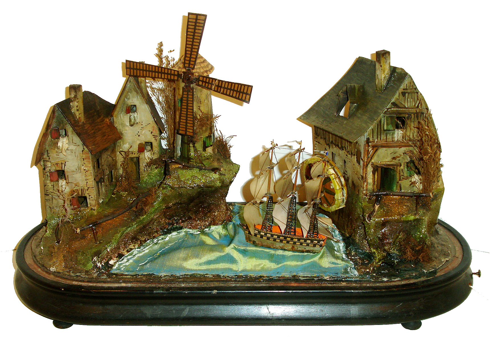 Swiss or German, country scene automata with painted card stock buildings, windmill, grist mill, and a tall ship, all powered by a concealed movement with 2 tune music box, the water wheel and windmill rotating as the ship rocks on the sea, with painted paper mache landscape, and on an ebonized base with glass dome, the inside painted with sky and a ship in the distance, c1870 — Antique Clocks Price Guide