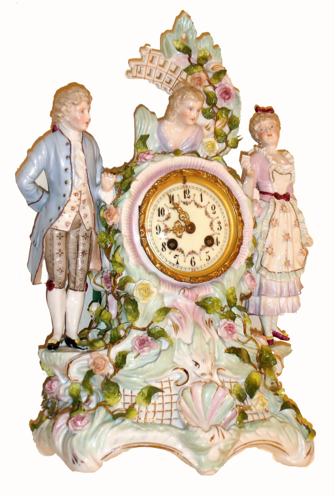 French, for J. E. Caldwell, Philadelphia, fine porcelain china bride's clock, showing Mom & Dad to the sides and with bust of daughter at top, the mother holding a tablet with vows, the whole surround by flowers with fine individual petals, and the quality 8 days, bell strike movement by S. Marti, with Caldwell info, c1890 — Antique Clocks Price Guide