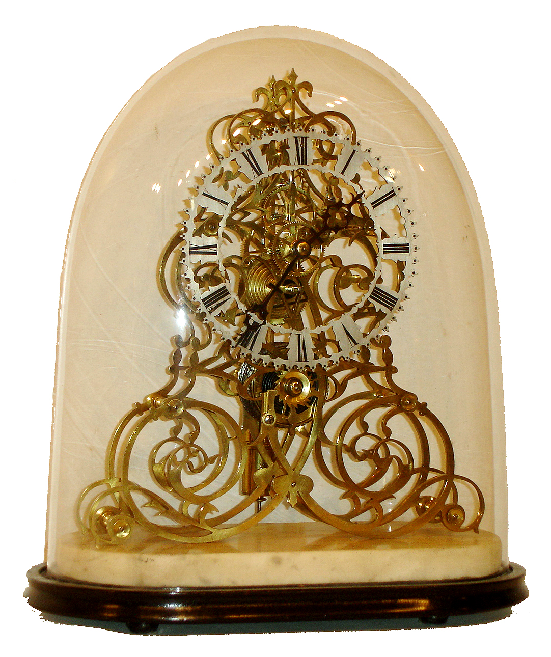 English, single fusee skeleton timepiece, in an extra fancy scrolling frame, with pierced silvered dial and glass dome, c1870 — Antique Clocks Price Guide