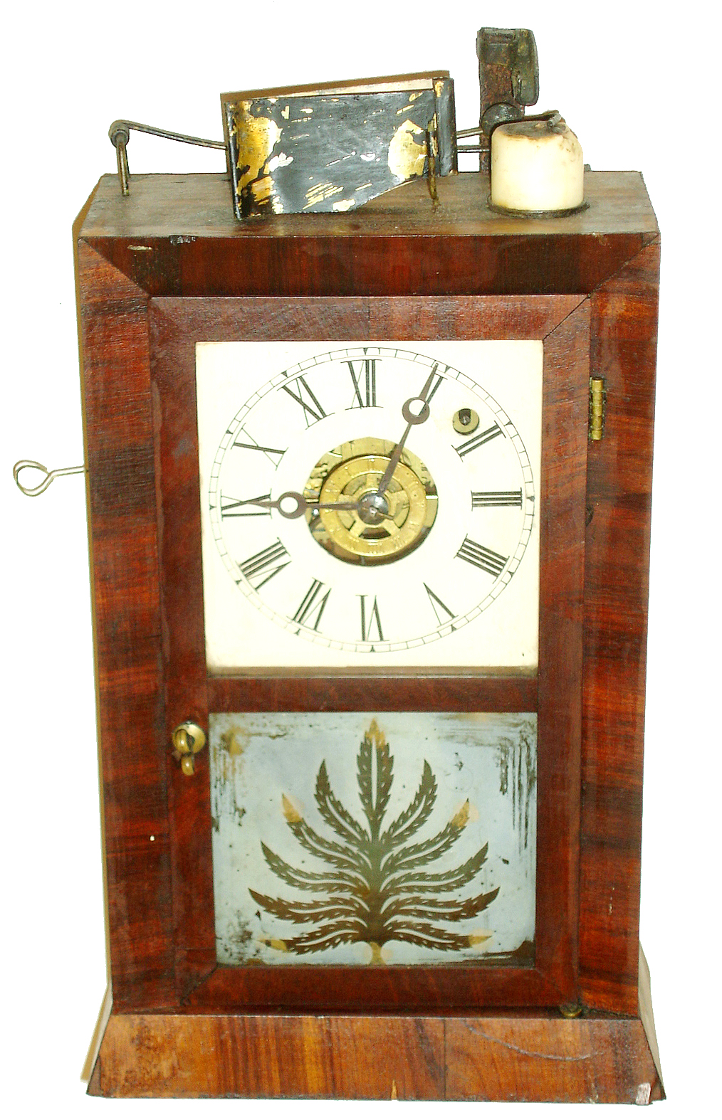Ansonia Brass & Copper Co., Ansonia, Conn., automatic candle light alarm clock, 30 hours, time and bell strike alarm, spring driven movement in a mahogany veneer case with a frosted tablet and painted metal dial, c1870 — Antique Clocks Price Guide