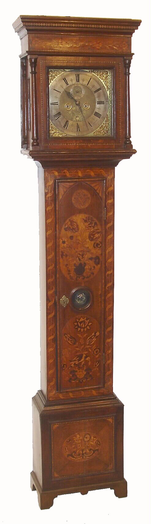 Luke Wise, Reading, England, tall clock, 8 days, time, calendar and bell strike, weight driven movement with count wheel strike; case of broad grained European walnut veneer, with avian themed marquetry inlaid flat top, with 3 1/2" bull's eye in trunk door with brass dial, cast brass cherub spandrels and silvered chapter ring, engraved "GOD SAVE QUEEN ANN" and maker's signature, c1710 — Antique Clocks Price Guide