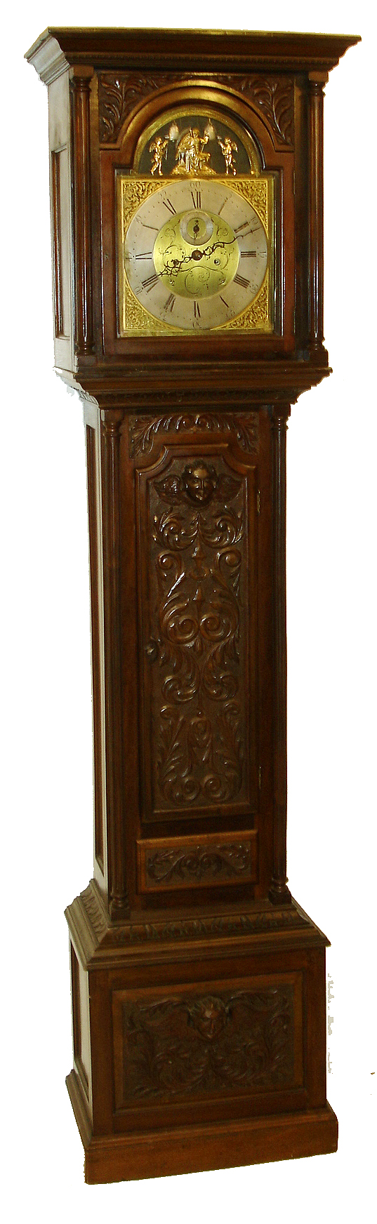 English tall clock, 8 days, time, strike and automata, two weight driven movement in a heavily carved flat top mahogany case with beveled glasses and automated striking figures in arch on brass dial with silvered chapter ring, c1890 — Antique Clocks Price Guide