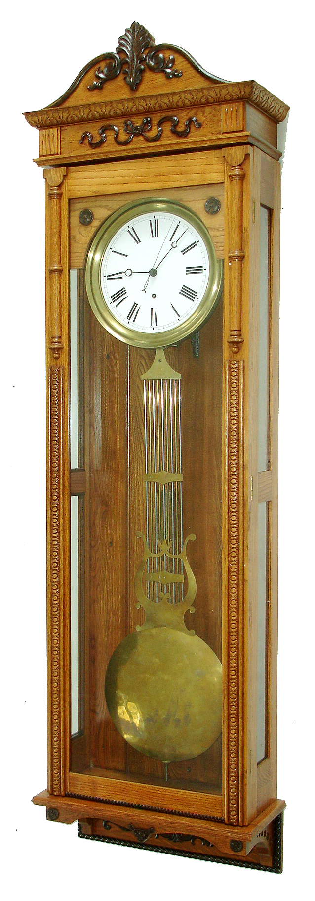 Jeweler's Regulator wall clock, 8 days, time only, brass weight driven French movement with pinwheel escapement, grid iron pendulum, center sweep seconds and white enamel dial in an American oak case, c1900 — Antique Clocks Price Guide