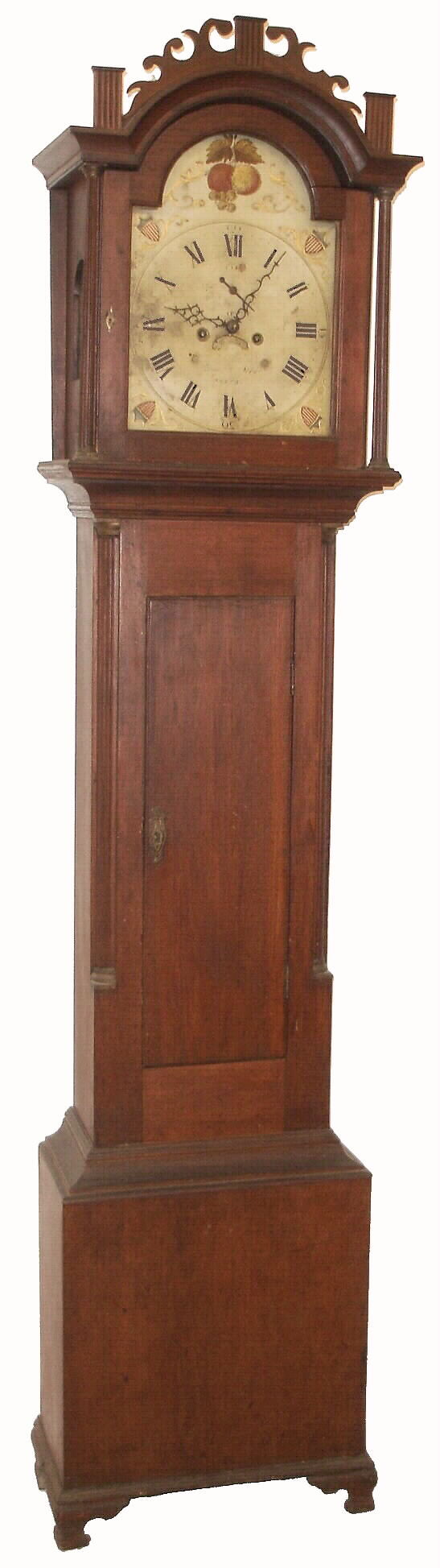 Samuel Abbott, Dover, N.H., tall clock, 8 days, time and strike, weight driven movement in a walnut (?) case with fretted hood, reeded full columns flanking dial, and trunk with reeded corner columns surmounted by brass capitals resting on ogee bracket feet. The painted iron dial is decorated with patriotic shields, c1812 — Antique Clocks Price Guide
