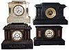 Clocks- 4 (Four) 8 days, time and strike, mantel clocks: one French onyx; one French black slate, one Ansonia enameled iron, one Ansonia black slate; three with visible escapements; late 19th century