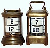 Clocks- 2 (Two) Plato brass and glass 30 hours, flipping-number digital timepieces: one rectangular with beveled glass; one cylindrical; c1905
