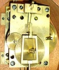 E. Howard & Co., Boston, reissue presentation banjo wall clock, mahogany case with line inlay and cross banding with carved bracket, acorn drop and with eagle finial, Mt. Vernon tablet and Washington portrait throat glass, brass bezel and side arms, convex glass, Roman numeral white painted metal dial, brass timepiece movement with uncrossed wheels, lead weight, brass pendulum, movement number M5B55, c1990