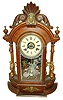 William L. Gilbert Clock Co., Winsted, Conn., "Occidental" mirror sided mantle clock, 8 days, time and strike, walnut case, c1891.