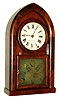 Brewster & Ingrahams, Bristol, Conn., beehive or "Round Gothic" mantel clock, 8 days, time and strike, spring driven brass movement in a mahogany veneer case with painted metal dial and cut and etched tablet, c1845