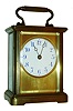 Chelsea Clock Co., Chelsea, Mass., for A. Stowell & Co., Boston, carriage clock, gilt case with beveled glass panels, Arabic numeral white enamel dial, 7 jewel 8 days, time only movement with lever escapement, serial #37394, c1915