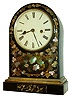 Chauncey Jerome, New Haven, Conn., 8 days, time and strike, gilt flower and vines with MOP fusee Beehive or round top case shelf clock, c1855 This very decorative ebonized wood case design would most likely appeal to the English market.