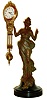 Junghans, Germany, "Diana" model swinger, 8 days, novelty timepiece, the patinated spelter figure mounted to an ebonized, turned wood base, her right hand supporting the clock with compound pendulum, white enamel Arabic numeral dial, blued steel hands, 8 days, time only movement, ca.1930