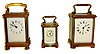 French carriage clocks- 3 (Three), all 8 days, time only movements and with lever platforms, the first a Mignonette #2, polished brass Corniche case, Roman numeral white painted dial signed "Bornand Freres Montbeliard", the others of standard size, one with polished brass Corniche case, Roman numeral white enamel dial, the other in a polished brass case on turned feet, with gilt, pierced brass frets at top and bottom, Arabic numeral white enamel dial, all 20th century