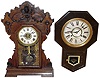 Clocks- 2 (Two) American, c1900: a Seth Thomas metal series "Metals No. 5" time, strike and alarm, oak mantel clock and a Waterbury "8 Inch Drop" time and strike, ebonized schoolhouse wall clock