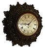 Charles Davis, London, carved wall clock, 8 days, time only, spring driven fusee movement in a intricately carved mahogany case with a silvered dial, c1820