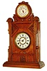 New Haven Clock Co., New Haven, Conn., "No. 6 Cabinet" mantel clock, 8 days, time, strike and perpetual calendar, spring driven movement in an ash case with painted time dial and papered calendar dial, c1875