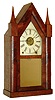 Chauncey Jerome, New Haven, Conn., steeple or "Sharp Gothic" mantel clock, 8 days, time and alarm, spring driven movement with J.S. Turner's Patent alarm in a mahogany veneer case with painted metal dial and mirror tablet, c1852