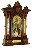 William L. Gilbert Clock Co., Winsted, Conn., "Amphion", 8 days, time and strike, and alarm walnut shelf clock, c1885l