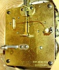 Postwar Swedish cartel clock, gilt case with carved roses, swags, and bowknot, brass bezel with convex glass, Arabic numeral, white painted metal dial, Louis XV style hands, 8 days, spring driven time and strike, movement, c1950.