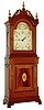 Foster Campos, Pembroke, Mass., Massachusetts shelf clock, 8 days, time only, weight driven movement in an inlaid mahogany case with fretwork top and three brass finials, painted metal dial, dated 1981