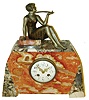 F. Marti, France, Art Deco style mantel clock, the case of contrasting marbles, top with a spelter figure of a seated young woman, gilt bezel with convex beveled glass, Arabic numeral white enamel dial with floral garlands, gilt Louis XV hands, 8 days, time and strike, Pendule a Paris movement, c1920