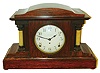 Seth Thomas Clock Co., Thomaston, Conn., wooden case mantle clock. 8 days, time and strike, spring driven movement in a red mahogany adamantine finish with four adamantine onyx columns, c1917