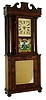 J.J. Beals, Boston, 30 hour, time and strike, weight wood movement c1835, in a mid 20th century hollow column case? This is a difficult clock to assess as it is not typical and was most likely custom made; pinning down a construction date is not easy.  Dr. Shaffer had bought this later in life when perhaps his eyesight was failing a bit, as the overall visual experience is stunning, however close inspection shows modern construction methods on the case.
