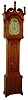 Solomon Yeakel, Berks County {PA), walnut scroll top tall clock, with 30 hours, brass movement, made with extra gear, seconds bit and false winding posts to simulate an 8 days, clock. Dial is marked "Barcks County", from the collection of Doug Shaffer, c1800