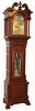 Walter H. Durfee, Providence, Rhode Island, for Bailey, Banks & Biddle, Philadelphia, Penn. on dial, 9 tube hall clock, 8 days, time, strike and 1/4 chime three weight driven movement playing Westminster or Whittington tune on tubes signed by Walter Durfee with patent date 1887 and with single jar mercury pendulum. The silvered brass dial has moon phase with elk scene, strike / silent and tune selector discs. The case is oak with a dark walnut finish and has carved cornice moldings, carved paw feet, broken arch top, 11 raised panels, barley twist columns, of which four are flanking the trunk and two are flanking hood, sunburst carving above trunk door and beveled glass in hood and trunk doors. There are exceptional lion's head escutcheons on both hood and trunk doors, c1895