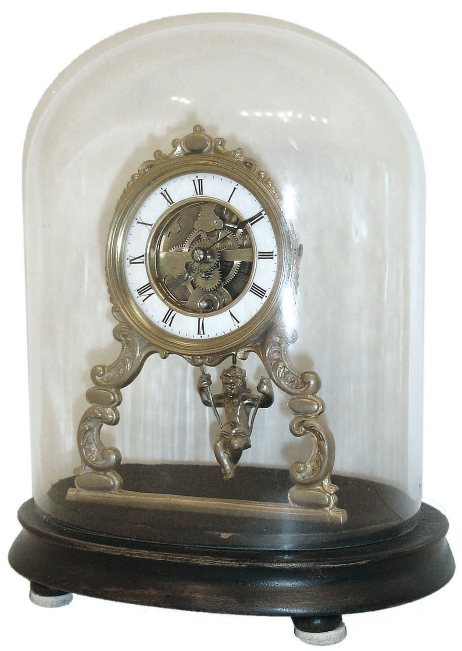 France, 8 day novelty timepiece, Roman numeral white enamel dial with open center, allowing movement to be seen, the case a gilt frame with scroll ornament, pendulum with seated figure, swinging as the clock ticks, mounted to a wooden base, and under a glass dome, c1880 — Antique Clocks Price Guide