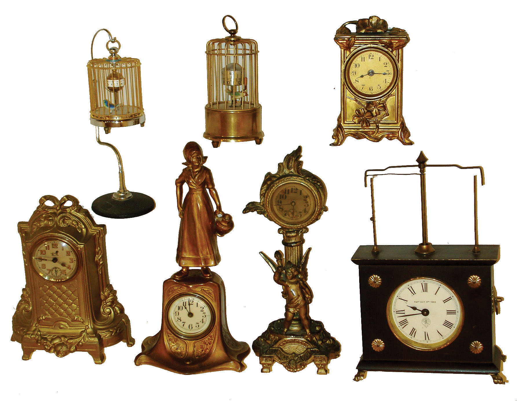Clocks- 7 (Seven) 30 hours, novelty clocks: Horolovar flying ball; four gilt cast metal, one marked "Duverdrey & Bloquel", one "France", one "Lux" and one "Made in USA"; two birdcages with annular dials, one Germany, one Japan — Antique Clocks Price Guide